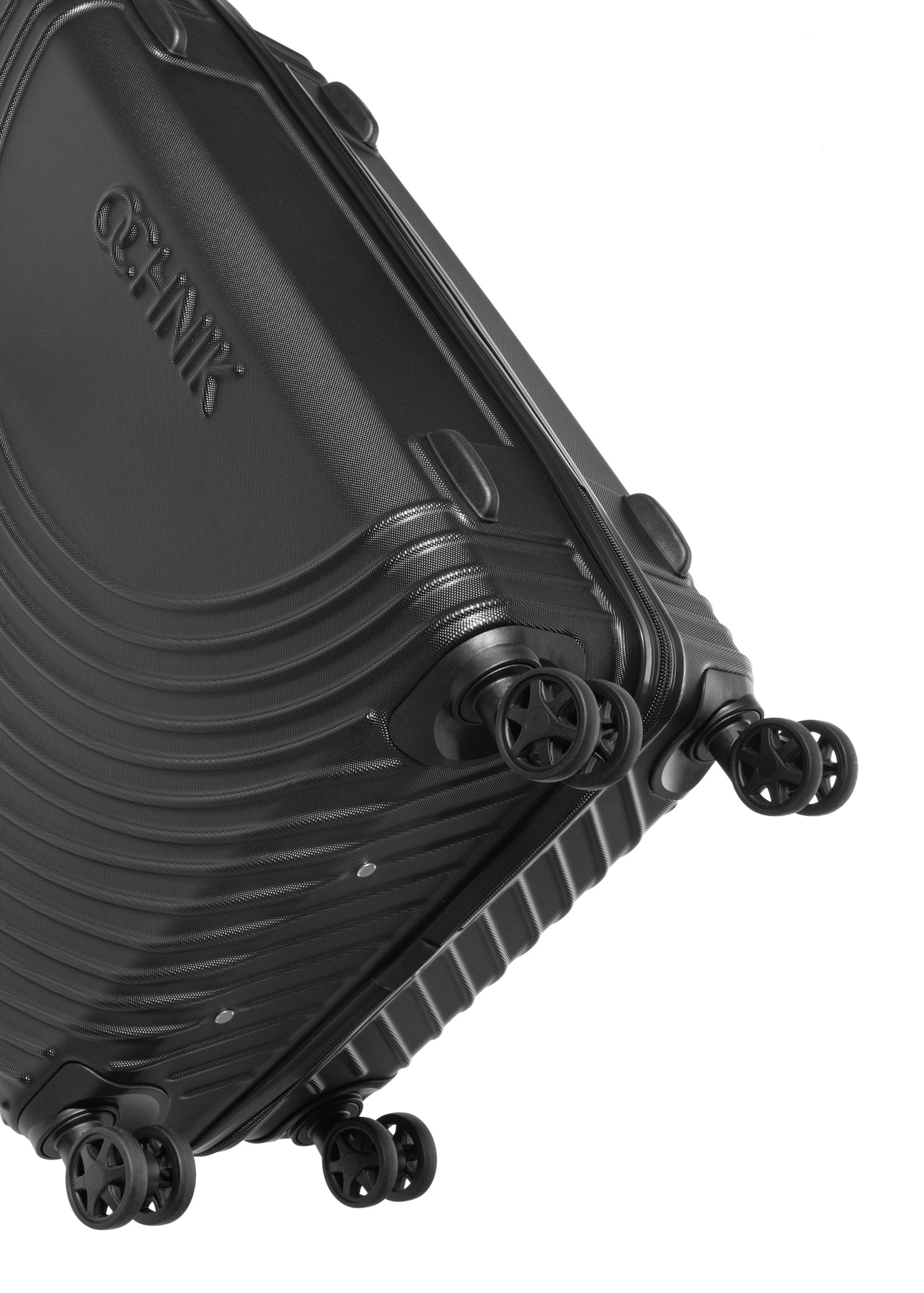 Komplet walizek na kółkach 19'/24'/28' WALAB-0088-99(W26), zbliżenie na kółka produktu na białym tle.