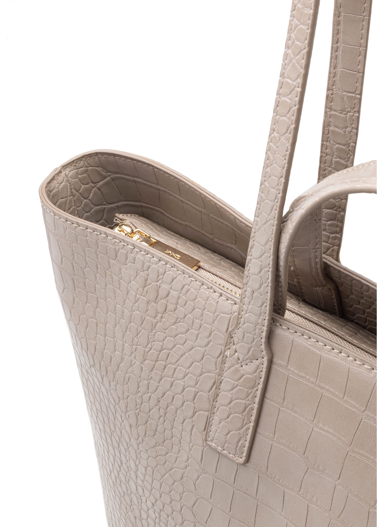 Beżowa torebka damska shopper TOREC-1204-1D(W26), zbliżenie na detal produktu na białym tle.