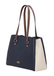 Granatowa torebka shopper damska TOREC-1260-7E(Z26), widok produktu skosem na jasnym tle.