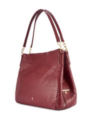 Ciemnoczerwona skórzana damska torebka shopper TORES-0636D-4C(W26) - widok produktu po skosie, na białym tle. 
