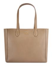 Ciemnobeżowa skórzana torebka shopper damska TORES-0971F-1K(W26) - widok produktu z przodu, na białym tle. 
